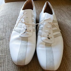 Men’s white athletic size 14 shoes. 75.00